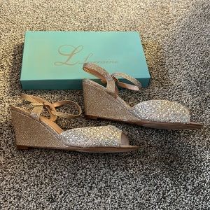 Beautiful gold and rhinestone heals. Brand new, only worn indoors to break in.